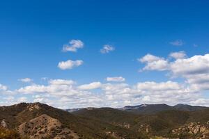 mountain peak with greenery on the sky background photo