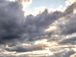 White fluffy clouds in the deep blue sky. Heaven background photo