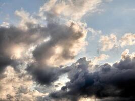 White fluffy clouds in the deep blue sky. Heaven background photo