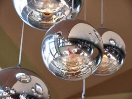 Modern ceiling lamps background, round lamps over ceiling pattern photo