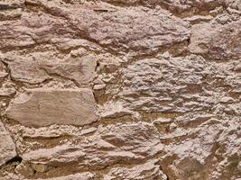 Brick wall background, stone pattern close view photo