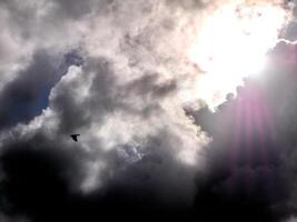 White fluffy clouds in the deep blue sky. Heaven background photo