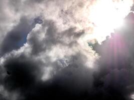 White fluffy clouds in the deep blue sky. Heaven background photo