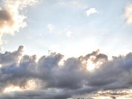 White fluffy clouds in the deep blue sky. Heaven background photo