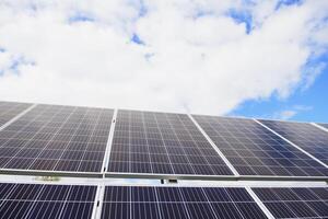 Green economic, solar panels to produce electricity from the sun photo