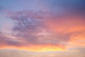 Beautiful dramtic cloudy sky sunset background photo