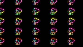 five neon heart  colorful rainbow same less move from left top to right bottom on the black screen video