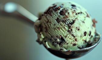 AI generated Mint chocolate chip ice cream scoop, closeup photo