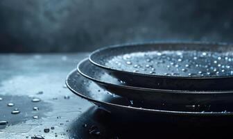 AI generated Empty black plates with water drops on dark background. Copy space. photo