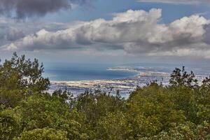 Breathtaking panoramic view of haifa from mount carmel, including sea port and residential areas photo