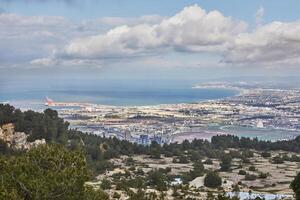 Breathtaking panoramic view of haifa from mount carmel, including sea port and residential areas photo