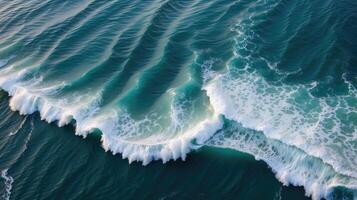 ai generado rítmico olas y espuma de mar patrones, un aéreo ver de del océano sereno majestad foto