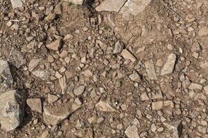 texture of sharp sea stones of different sizes photo