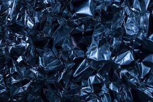 Full frame take of a sheeT of crumpled silver aluminum foil photo