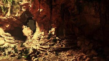 A cave nestled in the rugged beauty of a mountainous landscape video