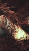 A cave filled with lots of cave like formations video