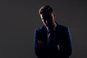 Close up portrait young man businessman. Caucasian guy business suit studio gray background. photo