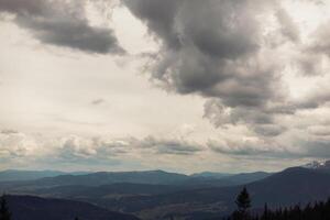 Beautiful cloudy sky in Carpatian Mountains photo