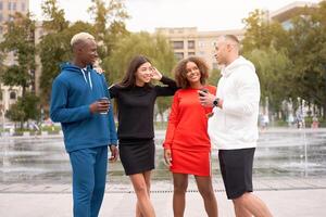 Multi-ethnic group people teenage friends. African-american, asian, caucasian student spending time together Multiracial friendship photo