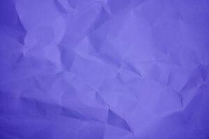 Violet Sheet crumpled paper color background  Close up Copy space photo