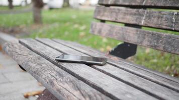 forget smartphone on a park bench, lost smart phone video