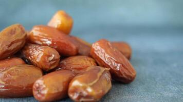 close up of fresh date fruit in a bowl on table video