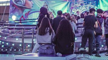 Rovigo Italy 25 October 2022 Young girls at the funfair Young girls at the amusement park video