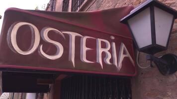 FERRARA ITALY 30 JULY 2020 Osteria sign that means restaurant in italian in Ferrara Italy video