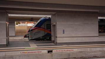 MODENA ITALY 01 OCTOBER 2020 Railway station detail with train in movement video