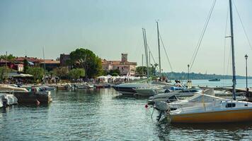 LAZISE ITALY 16 SEPTEMBER 2020 Boats on Lazise port on Garda Lake video