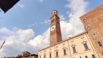 Lamberti tower in verona under a blue sky video