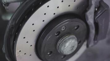 Detail of a perforated sports car disc brake 2 video