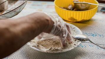 Breading of fish rings for frying video