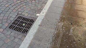 Manhole with rain 2 video