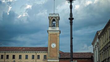 Bell tower with clock in Rovigo square 2 video