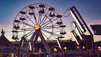 Funfair ferris wheel at sunset video