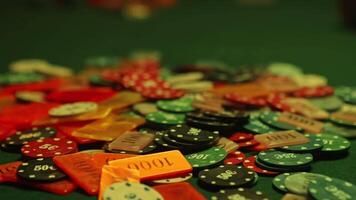 Chaotic scene of poker game with scattered chips on table hinting at high stakes video