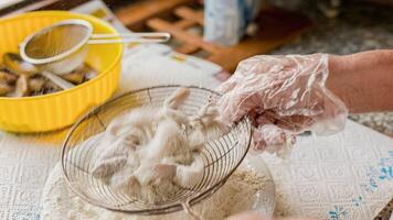 Breading of fish rings for frying video