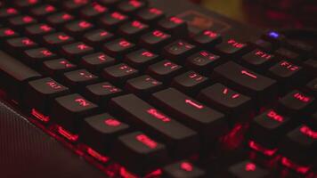 Close up backlit keyboard detail lit in the dark video