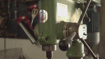 MILAN ITALY 6 MAY 2021 Drill press detail in a workshop video
