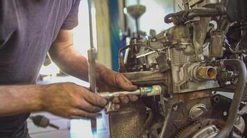 MILAN ITALY 5 AUGUST 2021 Mechanic puts his hands in the engine video