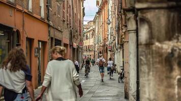 FERRARA ITALY 30 JULY 2020 Alley of Ferrara in Italy full of people walking video