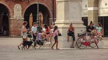 Rovigo Italy 08 August 2022 People relaxing city monument video