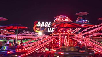 Rovigo Italy 25 October 2022 Carousel fairground plane at night video