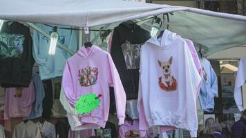 ROVIGO ITALY 30 OCTOBER 2021 Clothes stall at the street market video