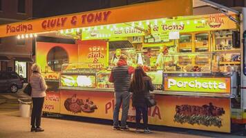 ROVIGO ITALY 30 OCTOBER 2021 People in front of the street food stall in Italy video