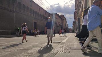 BOLOGNA ITALY 17 JUNE 2020 Ugo Bassi street in Bologna Italy with people walking video