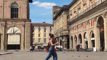 BOLOGNA ITALY 17 JUNE 2020 View of Piazza Maggiore in Bologna Italy full of people video
