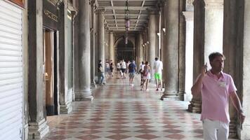 VENICE ITALY 5 JULY 2020 Arcades in Venice full of people walking video