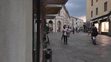 ROVIGO ITALY 17 JULY 2020 View of an alley in Rovigo in Italy with people walking video